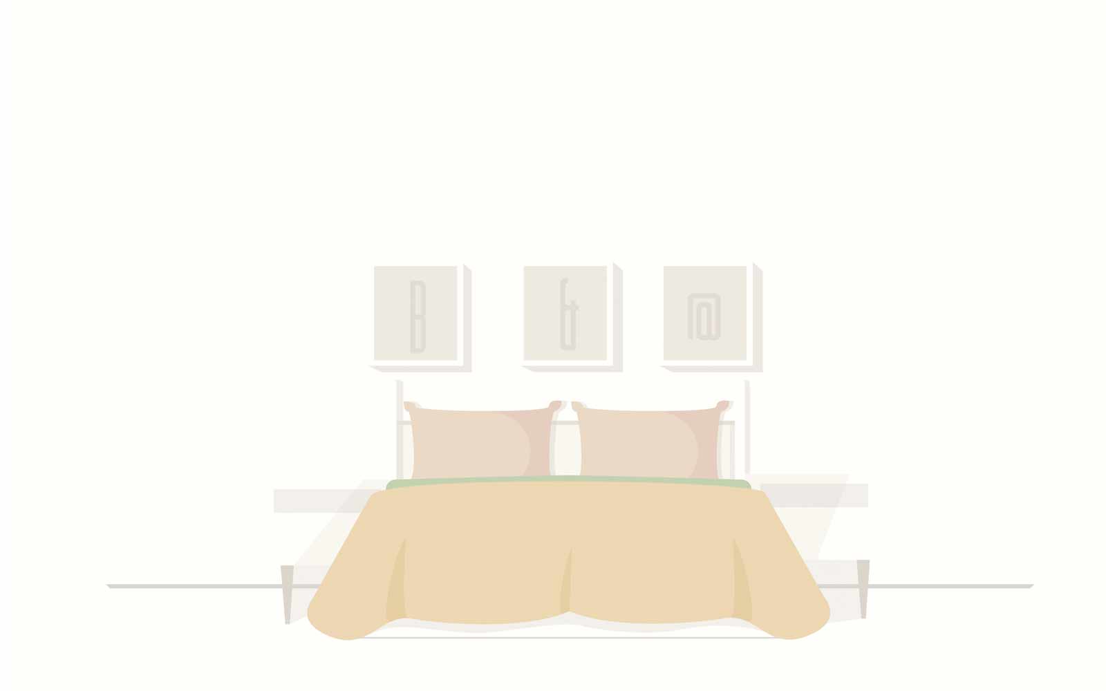 Кровать с подушками в комнате